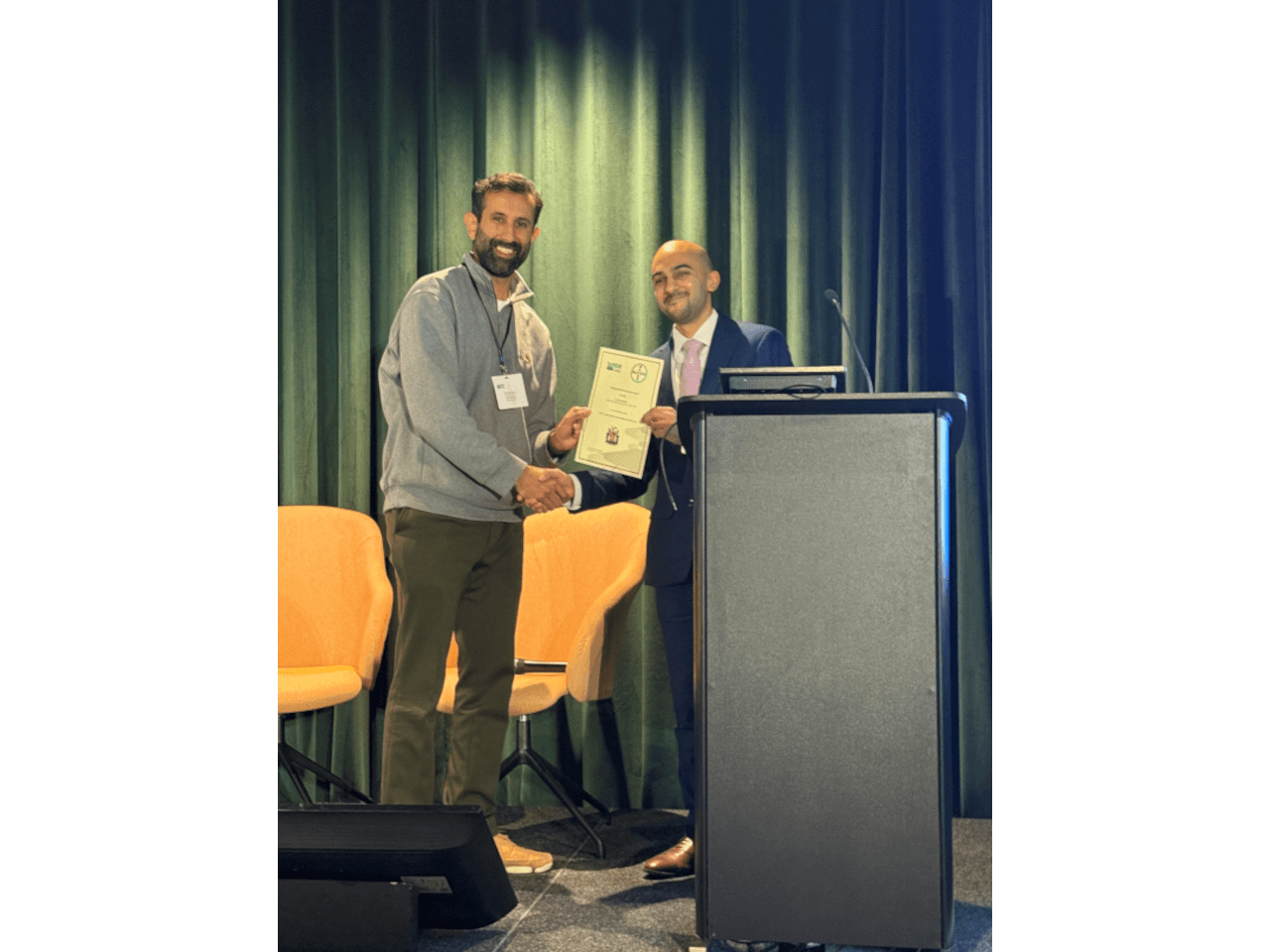 Dr Ahmed Maiter receiving award